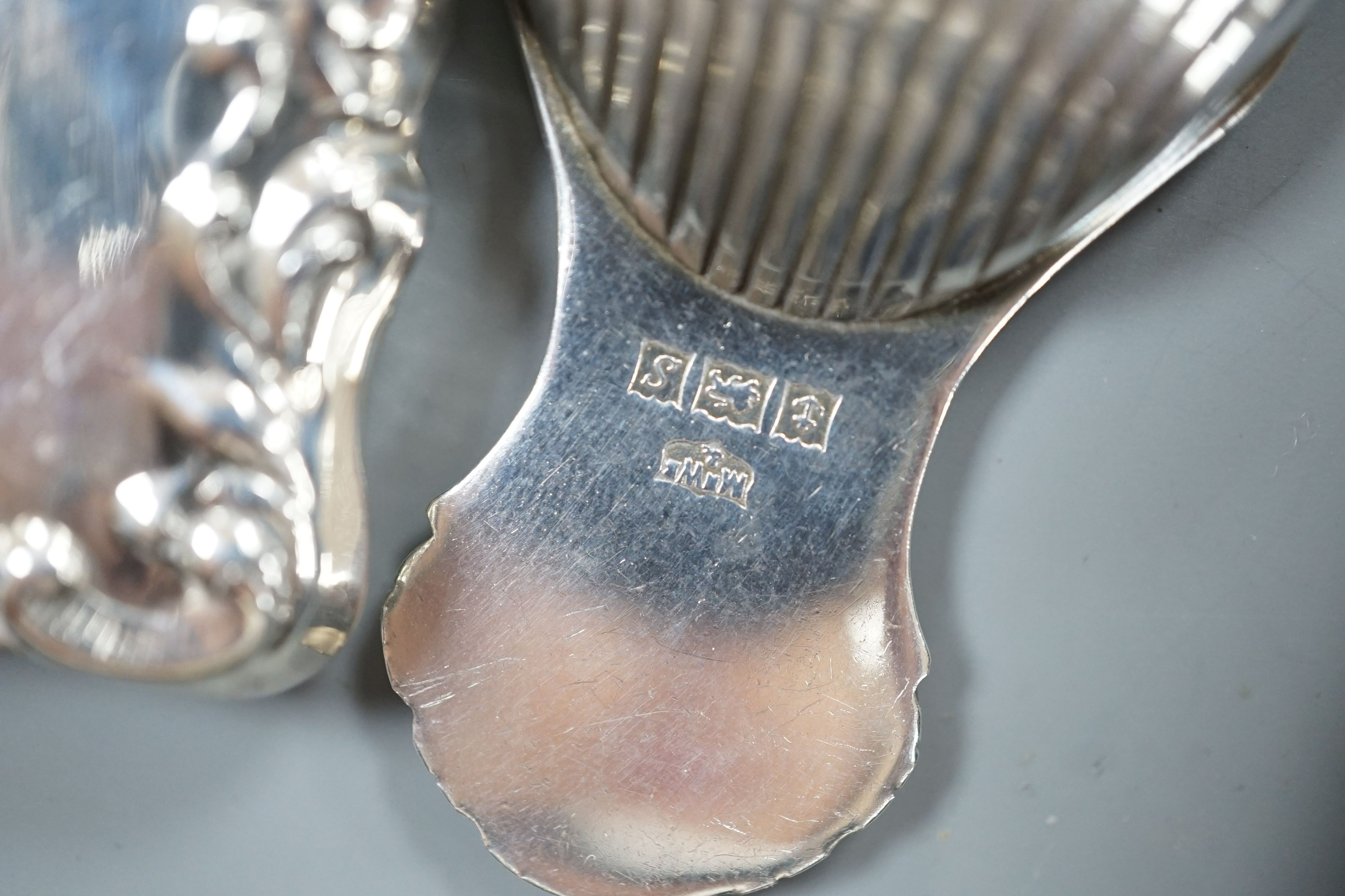 A Georgian style silver toddy ladle, London 1976, a silver mounted rectangular photograph frame, a caddy spoon, and a vesta case stamped Sterling